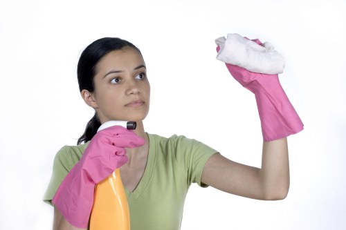 Professional upholstery cleaning equipment on a sofa